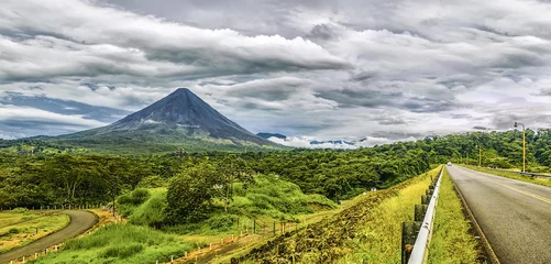 Stoff pro Meter Panoramic view of Arenal Volcano during a cloudy day © JaribFoto