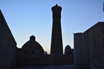 Silhouette of Bukhara architecture in the sunset colors