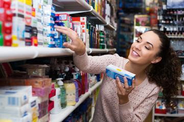 Female customer buying toothpaste