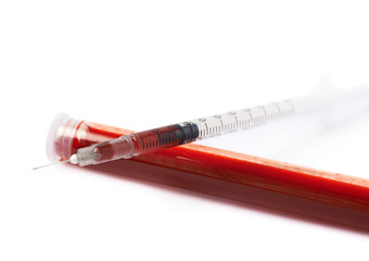 Fototapeta premium Medical syringe and test-tube isolated