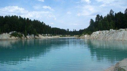 Lake and water inside mountains in deep forest