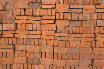 Fototapeta premium Bricks stacked in piles /Bricks background