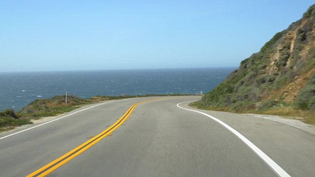 Vehicle point-of-view on California Highway 1 (aka Cabrillo Highway or Pacific Coast Highway) in the Big Sur area of Central California