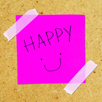 I am happy note on violet sticker paper note isolated on board.