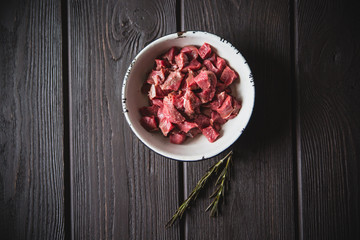 minced meat on wooden table
