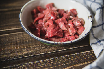 minced meat on wooden table
