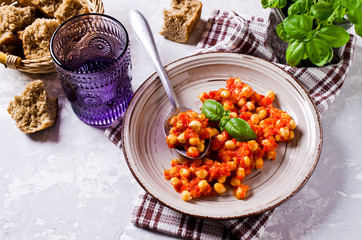 Chickpeas cooked with  sauce
