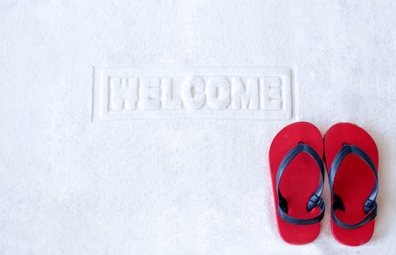 Welcome mat with red child  sandals