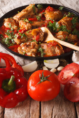 Chakhokhbili Chicken with ingredients close-up. vertical
