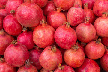 Group of pomegranates. Pomegranate closeup, background