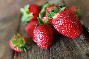 strawberries on a wooden background