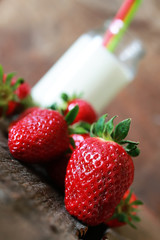 strawberries and milk in a glass