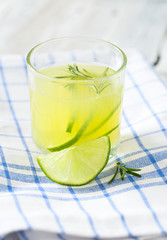 lime lemonade on wooden background