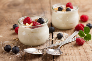 Yogurt with granola or muesli and fresh berries