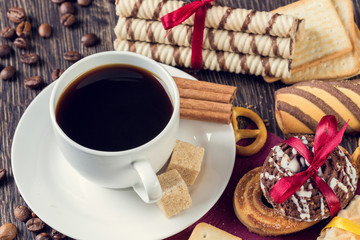 Biscuits and coffee on table