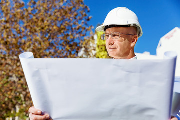 Engineer builder at construction site