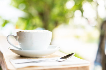 coffee cup on wooden table ,soft focus