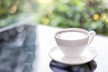Coffee cup on table ,mocca ,soft focus