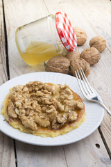 Pancakes with walnut and caramel for a breakfast