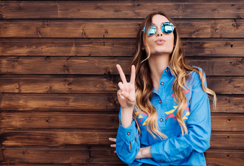 Cool hipster student woman wearing eyewear glasses . Caucasian female university student looking at camera smiling happy.