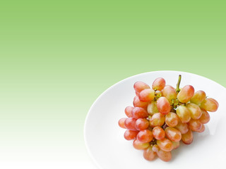 fresh grape fruit on white dish in green background thailand 4