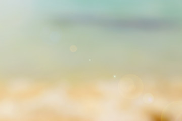 Fototapeta na wymiar Abstract blurred ocean seascape background. Sandy beach with tur