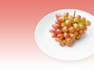 fresh grape fruit on white dish in pink background thailand 3