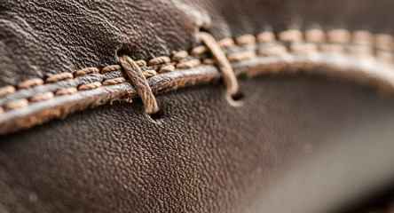 Leather shoes, focus on details. Macro shot with shallow depth of field.