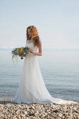 Fototapeta na wymiar Young bride with flowers