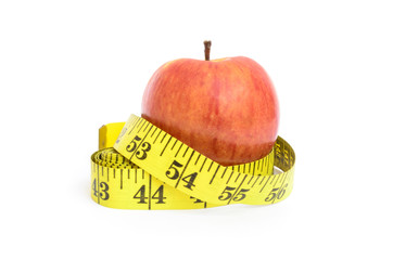 Measure tape and apple. Dieting concept