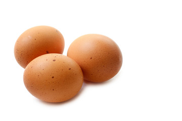 Chicken eggs closeup on white background
