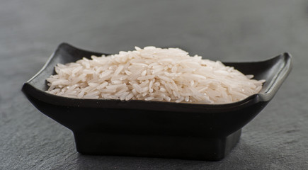 Basmati rice on black background