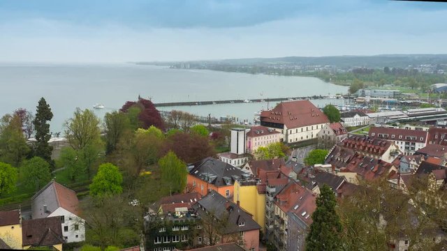 Time lapse. The view from the heights of the old town of Konstanz. Old buildings of the old city can be seen in the foreground and on the horizon lake Constance 