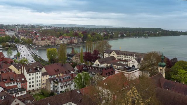 Time lapse. The view from the heights of the old town of Konstanz. Old buildings of the old city can be seen in the foreground and on the horizon lake Constance 