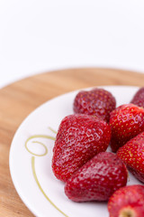 Aerial top view flat lay strawberries on the plate