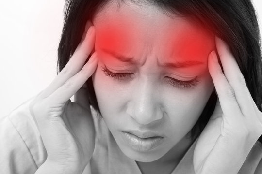 patient suffering from headache, stress