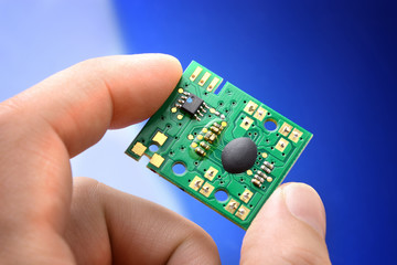 micro processor chip in hand