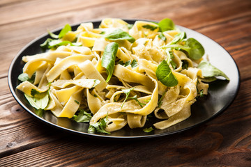 Cooked tagliatelle on a plate