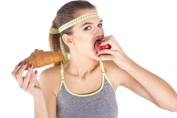 Fototapeta premium excited scared woman diet concept choosing eat apple
