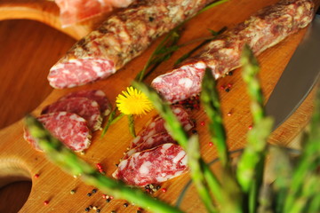 Homemade Italian salami on the wooden board