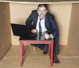 Angry businessman hits his fist on the table