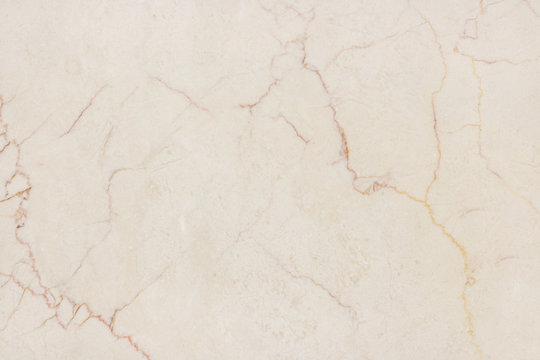Beige marble stone wall background, texture.