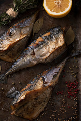 Grilled mackerel with herbs and spices in a pan