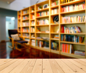 Blurred books on the shelf in public library. Blurred effect