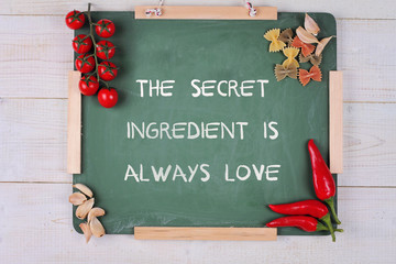 Motivation words the Secret ingredient is always love. Happiness, family, home, cooking concept. Inspirational quote.