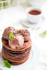 Stack of Homemade Chocolate Pancakes for Breakfast