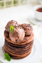 Stack of Homemade Chocolate Pancakes for Breakfast