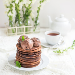 Stack of Homemade Chocolate Pancakes for Breakfast