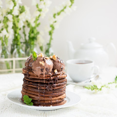 Stack of Homemade Chocolate Pancakes with Chocolate Ice-Cream