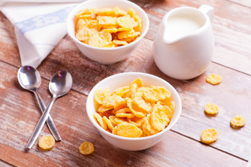Cornflakes and milk for breakfast closeup
